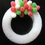 Gluing spice drops to styrofoam round