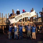 Raising the Boomtown sign. Note the Bostich nailer we used to secure it. Also note the camera operator.