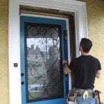 Installing a thermally efficient Therma-Tru fiberglass door.