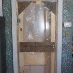 A site built "door" helps control dust without restricting egress.