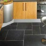Slate Kitchen Floor Install flooring under the appliances and islands.