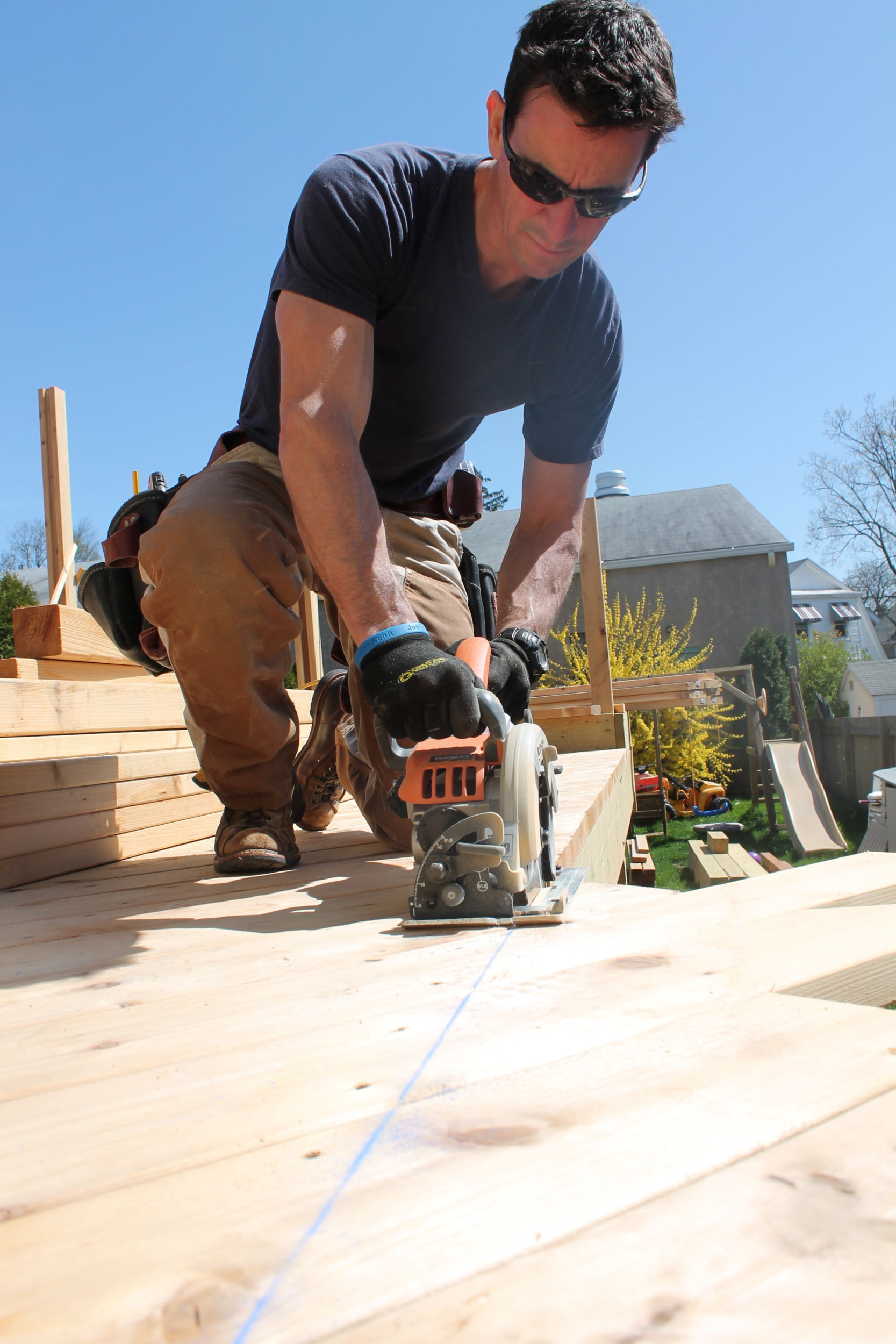 Mark trimming cedar deck boards