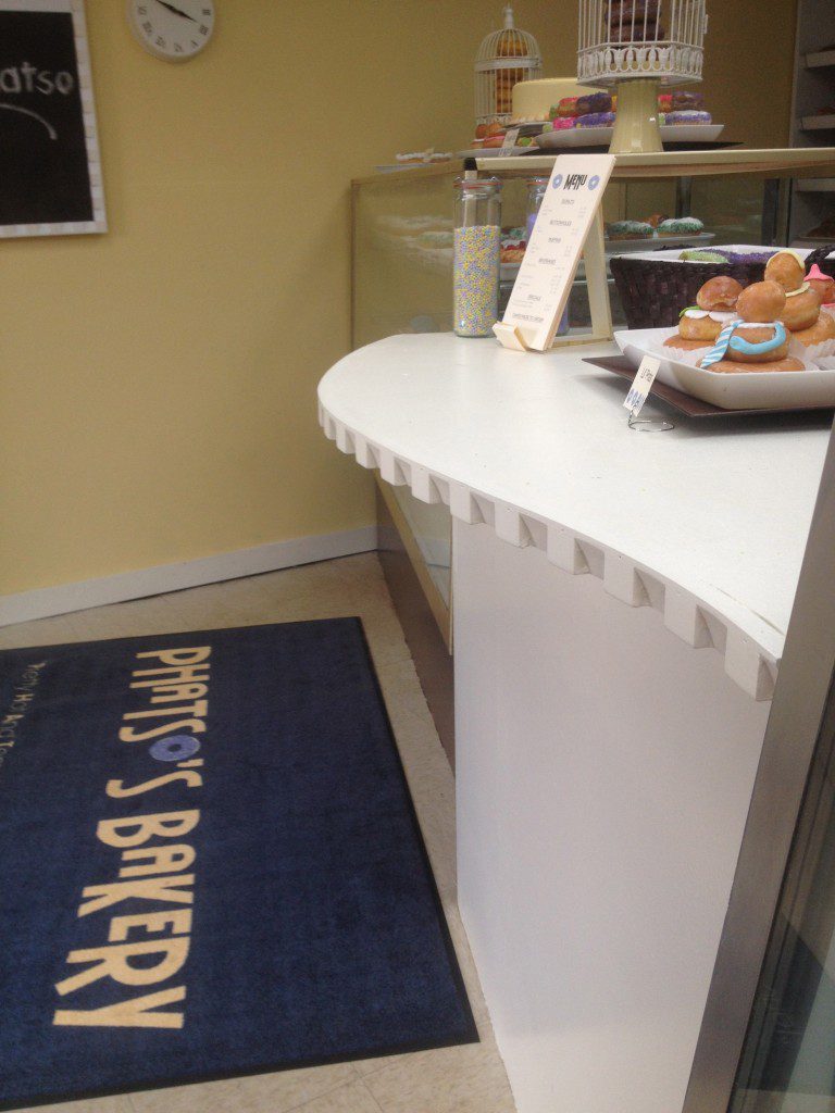 Counter with dentil molding on Save My Bakery