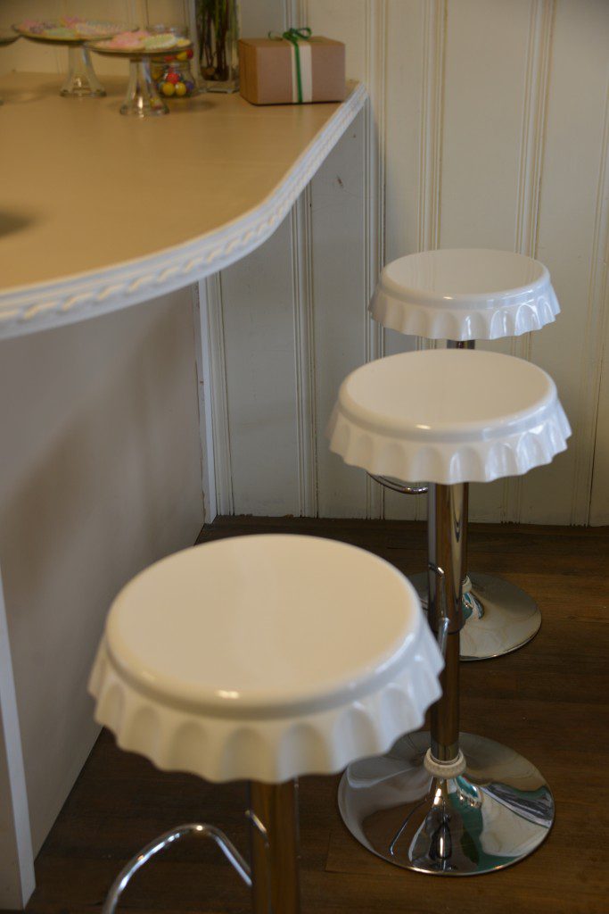 Save My Bakery AFTER: Schubert's now has seating. Little stools that look like upside-down pie plates add to the small town charm.