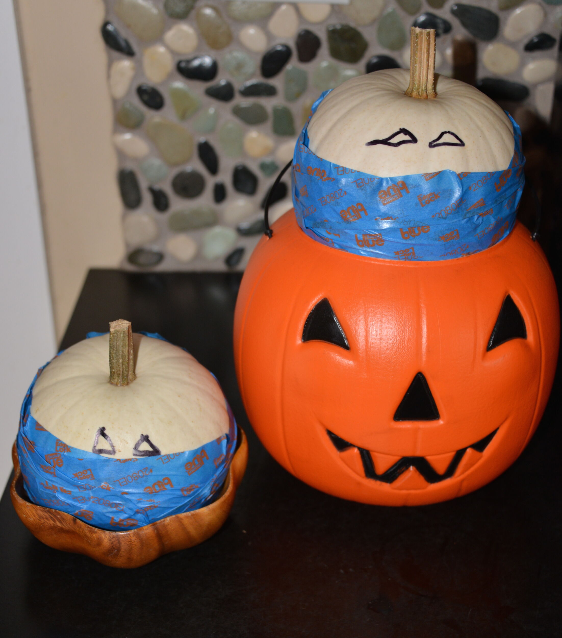 Ninja pumpkins in their coffins amazed and amused