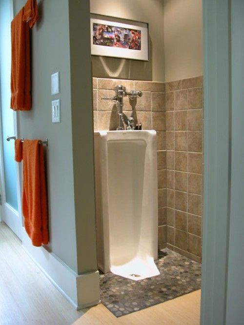 Don't forget the full length urinal in your bathroom man cave.