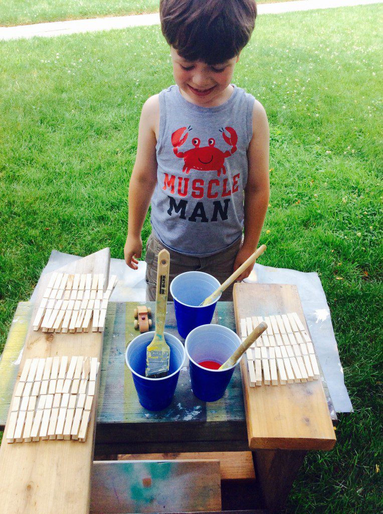 Jack is ready to start our kid craft for Fourth of July.