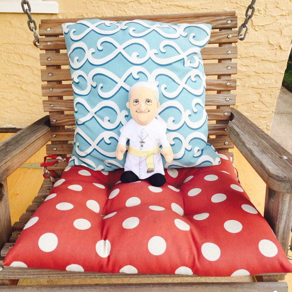 Our porch swing is a favorite spot for Plush Pope to think and relax.