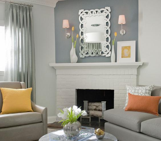 bold color small space The easiest place to add bold color is through decor like pillows. The other expert design idea in this photo is the use of grey. Notice how the grey behind the mantel fits in flawlessly because of its use on the sofas. MyFixitUpLife