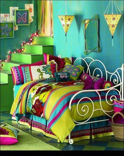 This bedroom might be way too bold for many of us, but it showcases the analogous look with yellow, yellow-green, green, blue-green, blue, and violet. A huge feat in using color.