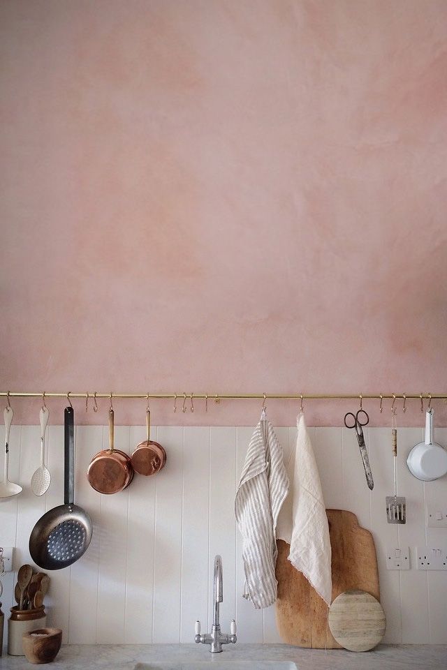 Why not use the Rose Quartz pink in a texturized way? Pink doesn't always have to be a solid color. Here the kitchen takes on a romantic and earthy vibe. 