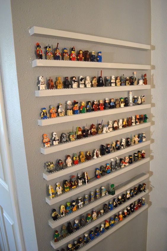 Lego minifigures are ready to play when they are organized and on display. 