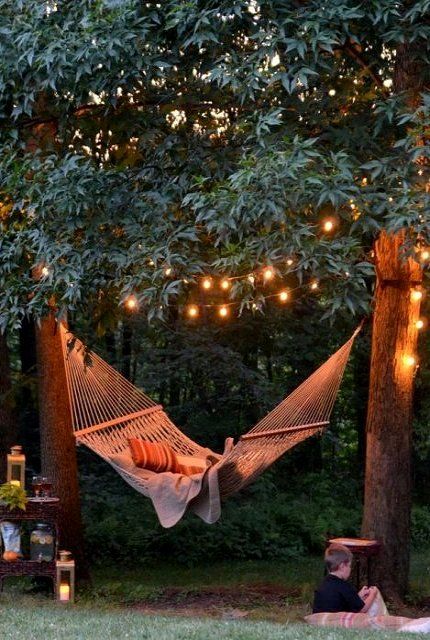 Backyard hammock with string lights can make a magical backyard retreat.