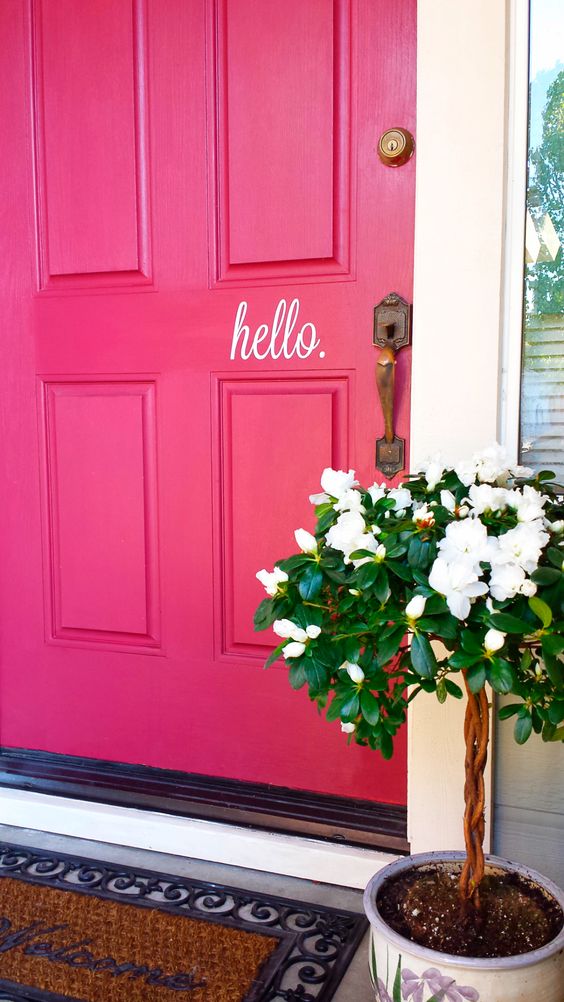  Hot pink door says a lot about who might be inside.