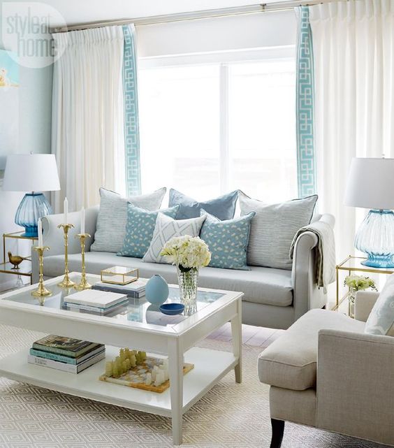 1 Quaint and chic living room with the seaside sophisticate vibe.
