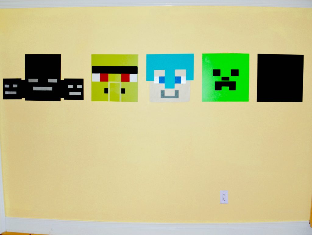On one wall of the bedroom I'm making a Minecraft mural with the five characters Jack selected.
