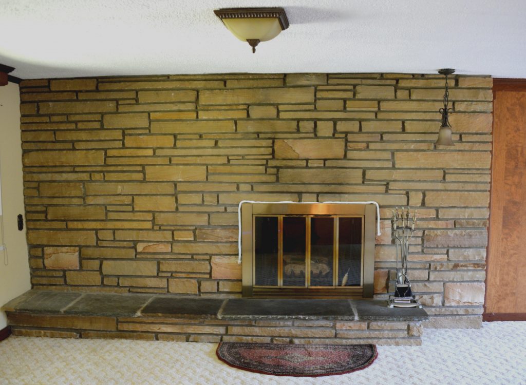 There are times when a brick or stone fireplace is screaming in sadness for a coat of paint. And when I spotted this fireplace at a client’s new-to-them-but-stuck-in-1980s home, I knew that a fresh coat of paint would perfectly freshen up the entire family room.