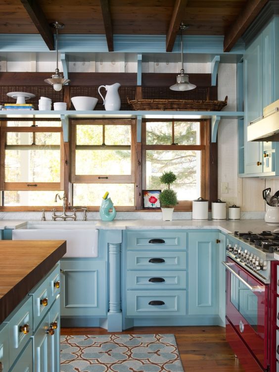2 Red apple stove in a sweet blue farmhouse kitchen