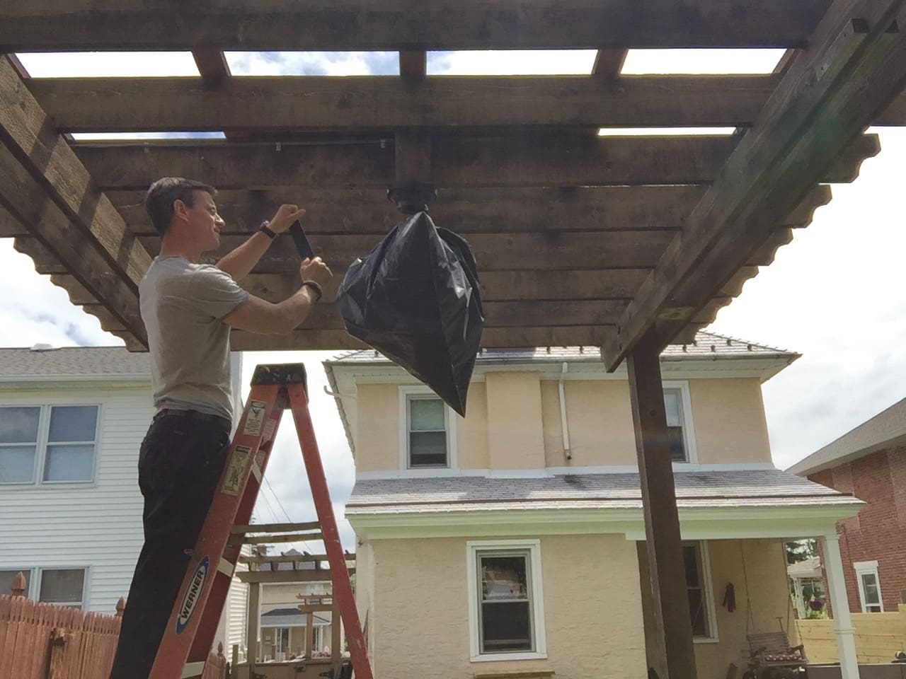 Man v. Pergola How to clean, stain and seal a wood pergola