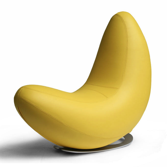 While there are many banana pillows and bean bag chairs filling up Google images, this is an elevated version. It's an ecoleather banana chair. bananas home decor