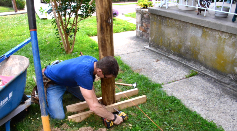 5 MyFixitUpLife How to place a fence post_secure to base with screws_