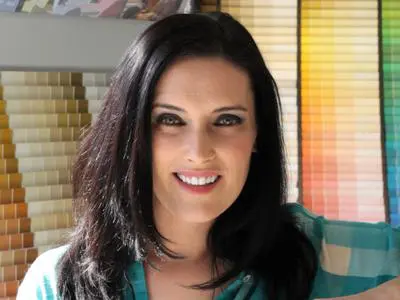 Laurie March in front of Paint samples - MyFixitUpLife