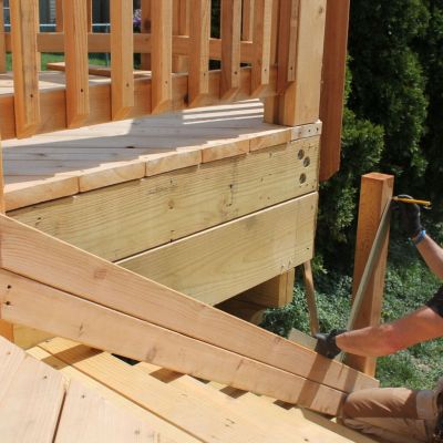 Use a framing square and double 2-bys to layout stair posts.
