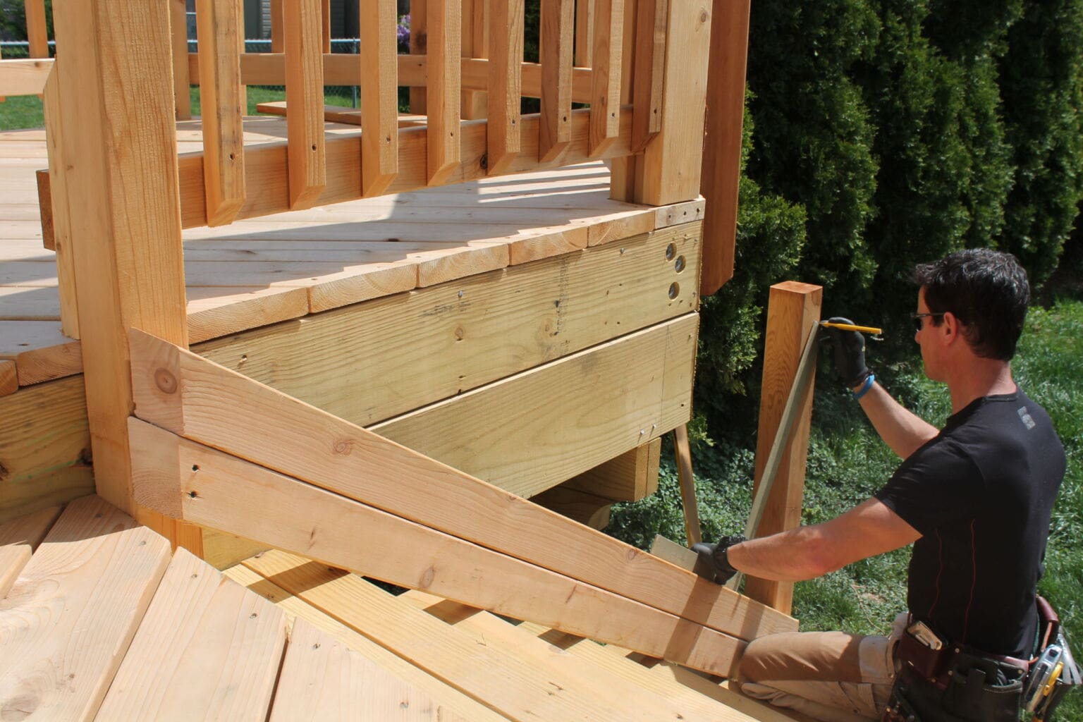 Use a framing square and double 2-bys to layout stair posts.