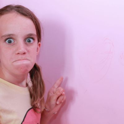 Lexi is unhappy about crayon on her wall