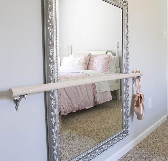 A ballet barre can easily go over almost any mirror.