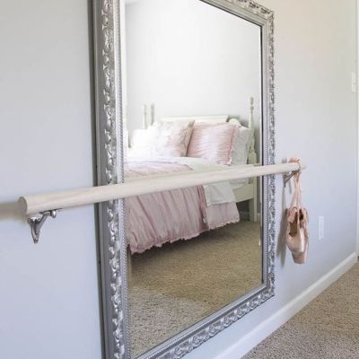 A ballet barre can easily go over almost any mirror.