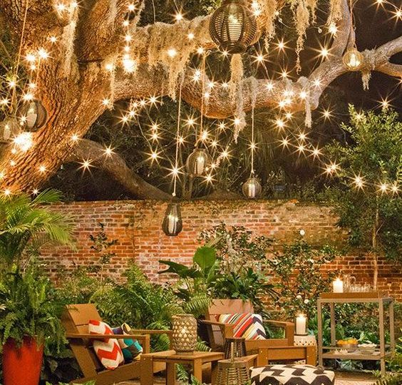 String lights and some festive decor make this backyard into a retreat