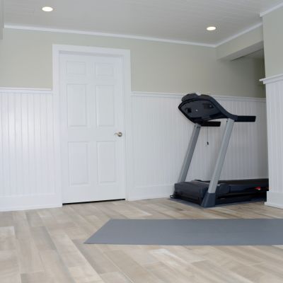 2016_MyFixitUpLife_Basement Renovation_TileBar_Wood Naturally_Wainscoting_Treadmill_Tile Installation_Hoss Magazine