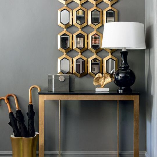 A little touch of black, brass, and style gives this the beer luxe look to me.