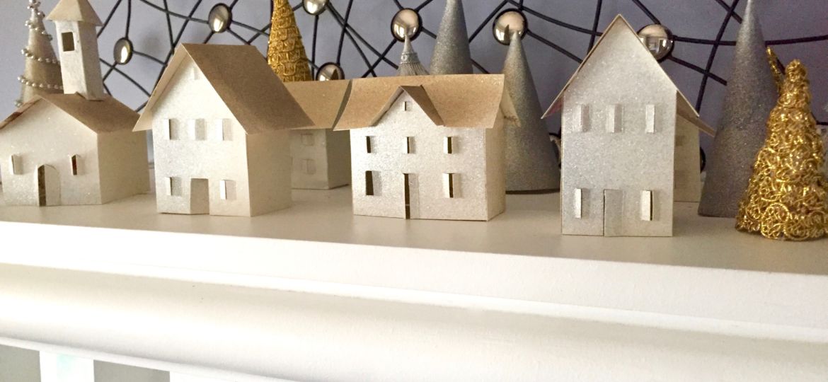 The little holiday village is making me so super happy on our mantel MyFixitUpLife 2