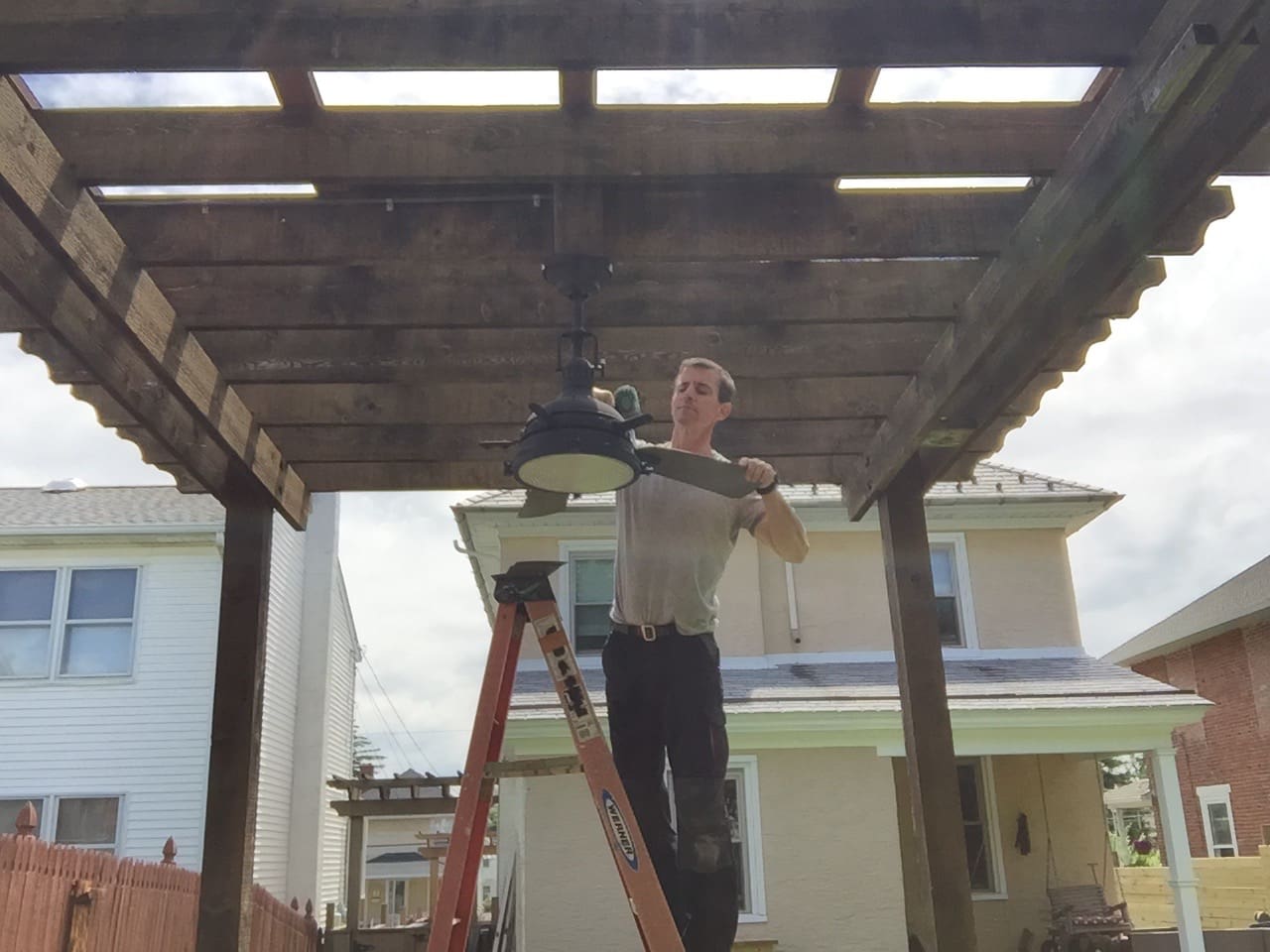 How to clean a wood pergola before applying new stain