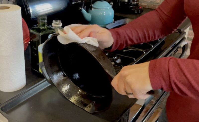 wipe cast iron pan with oil to season myfixituplife