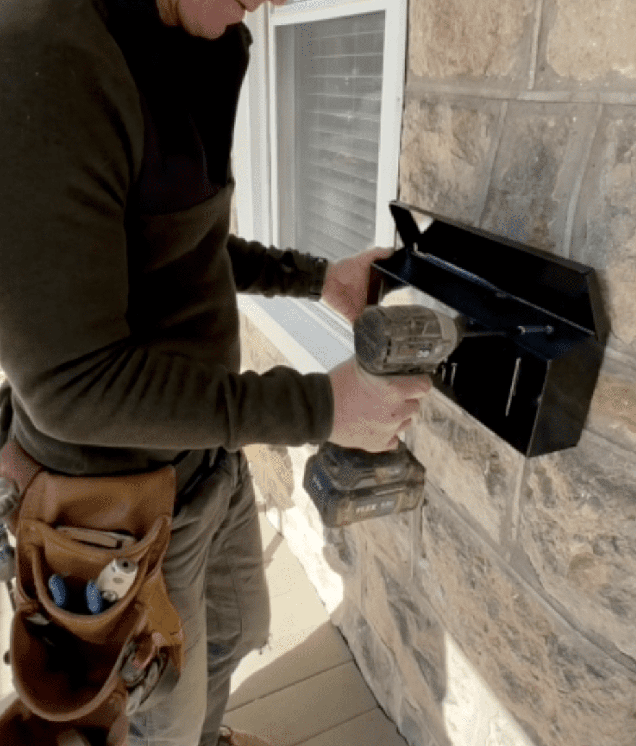 How to hang a mailbox on a stone house