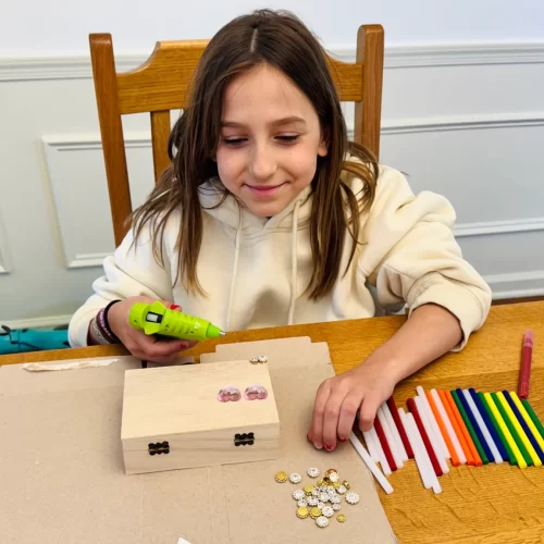Delia testing the colored glue sticks and Surebonder glue gun
