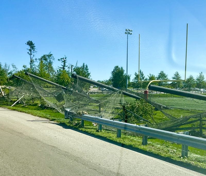 Fort Washington Tornado 9 Why I Joined a Tornado Clean Up Chainsaw Gang MyFixitUpLife Collapsed chain link fence and bent goalposts beside a sports field after a storm or incident MyFixitUpLife