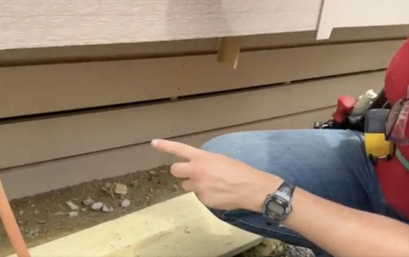 Theresa shows a critter wall under a porch How Do I Stop Animals From Dying Under My Deck MyFixitUpLife MyFixitUpLife Theresa shows a critter wall under a porch MyFixitUpLife
