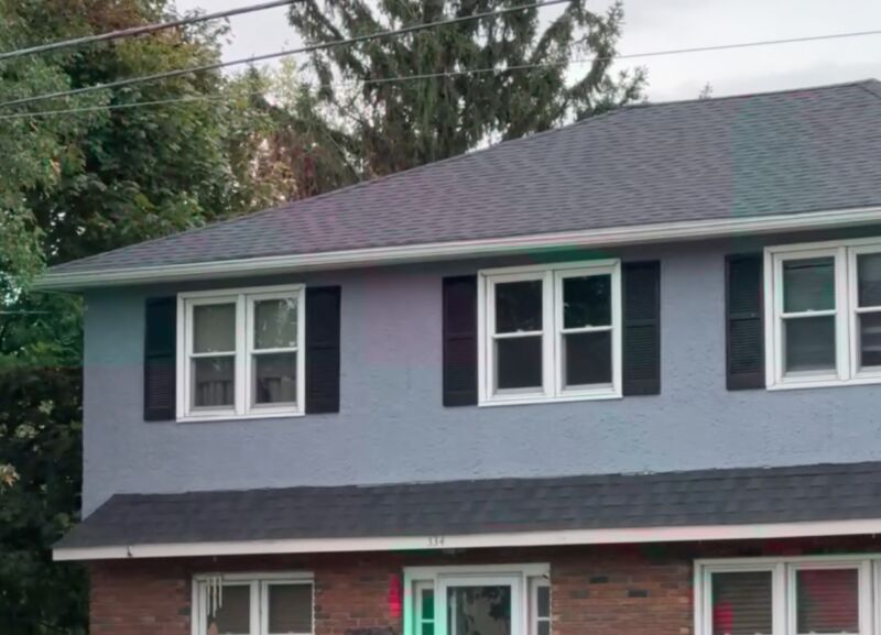 Shutters small 6 Window Secrets That Could Save You Thousands MyFixitUpLife MyFixitUpLife Two story house with blue upper level brick ground floor white framed windows and black shutters gray roof MyFixitUpLife